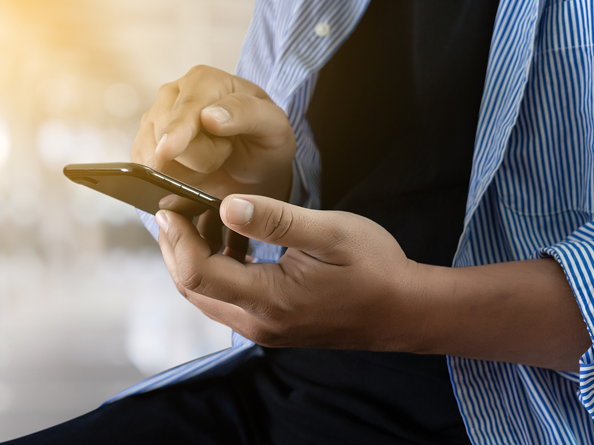 Man calling a customer support hotline.