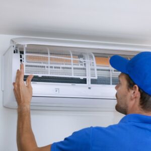 technician working on an AC