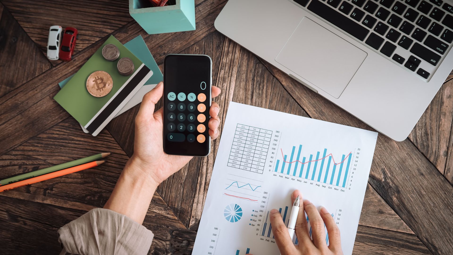 calculator, computer, and paperwork