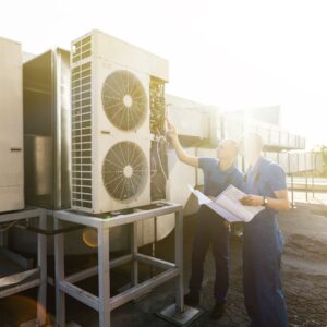 hvac technicians inspecting commercial units