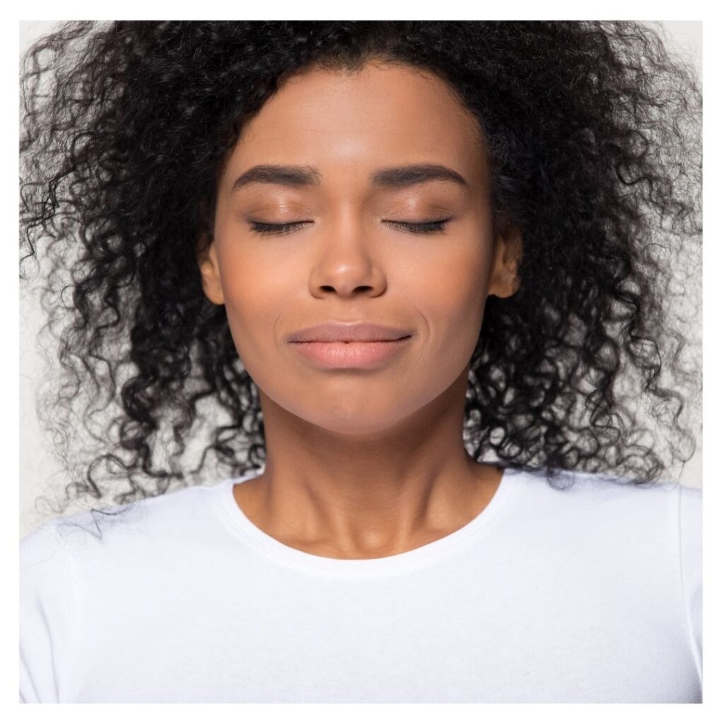 Women taking a deep breath