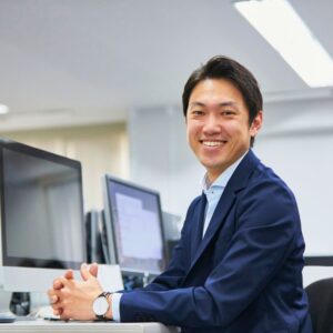 happy person at desk breathing clean air