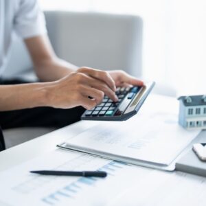 Person doing calculations of business expenses